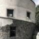 white round building with partial stone facade