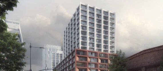white tower building with concave apartment windows