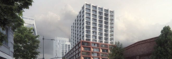 white tower building with concave apartment windows