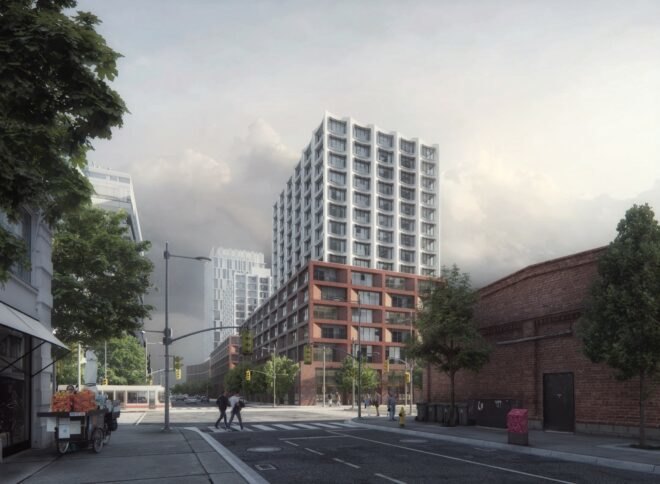 white tower building with concave apartment windows