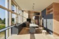 kitchen space with gray cabinets and wooden flooring