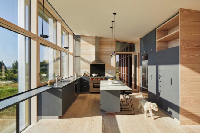 kitchen space with gray cabinets and wooden flooring