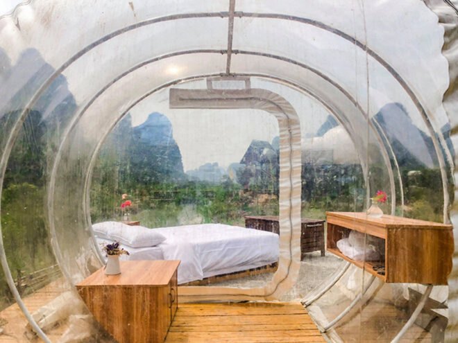 bedroom inside transparent bubble dome
