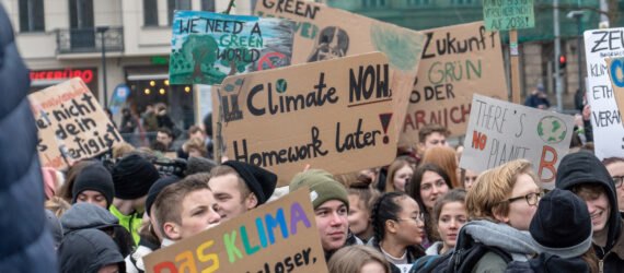 students protesting holding signs