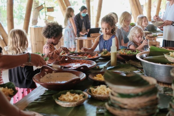 students eat fresh fruits and vegetables