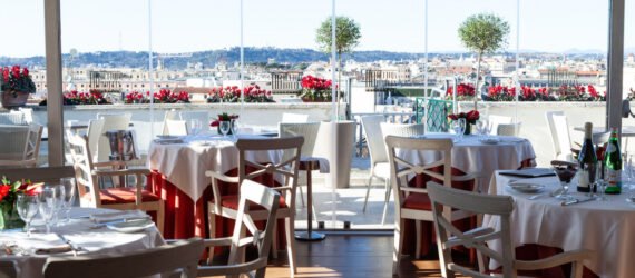 restaurant with white tables and glass walls