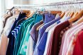 rack of vibrant multi-colored clothing