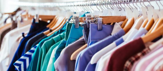rack of vibrant multi-colored clothing