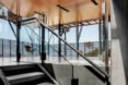 stairs leading to a glass-encased room