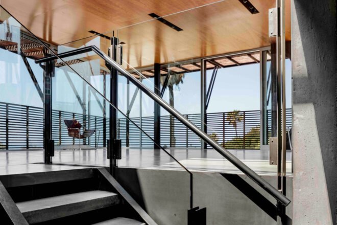 stairs leading to a glass-encased room