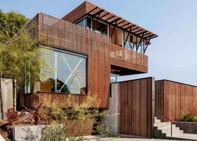 tall staggered home with wood screens