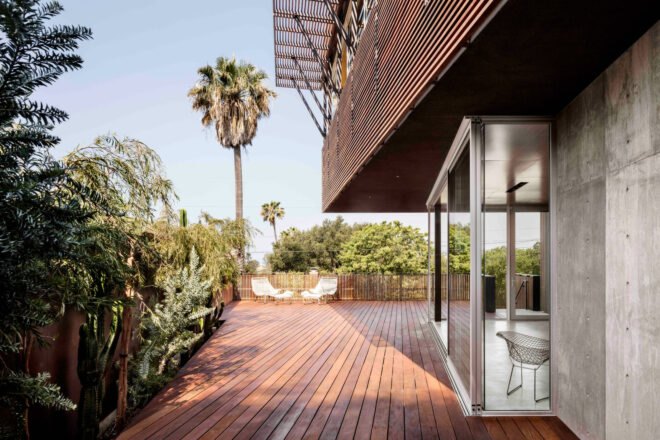 glass room leading to outdoor patio