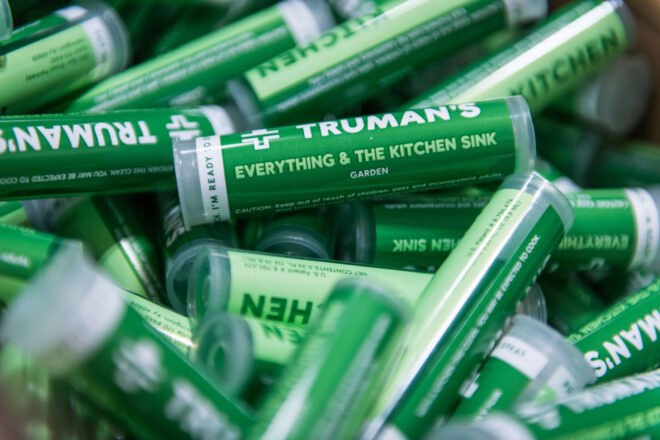pile of green cartridges filled with cleaner concentrate