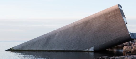 long gray building partially built underwater