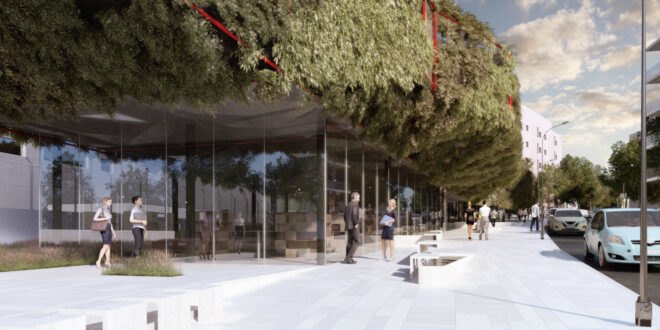 building with glass walls topped with greenery
