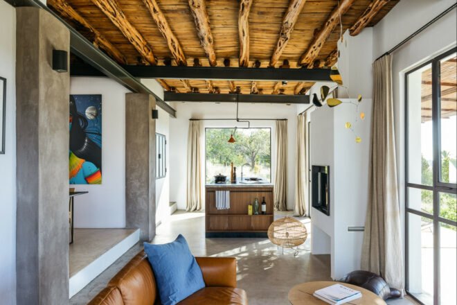 interior living space with modern furnishings and wood ceiling beams