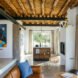 interior living space with modern furnishings and wood ceiling beams