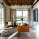 white living room with leather sofa