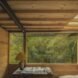 interior of treehouse with wood ceiling and skylights
