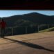 mountainous views from a large wooden deck