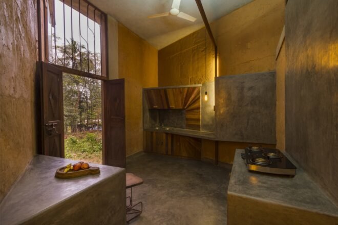 kitchen in room with mud walls