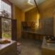 kitchen in room with mud walls