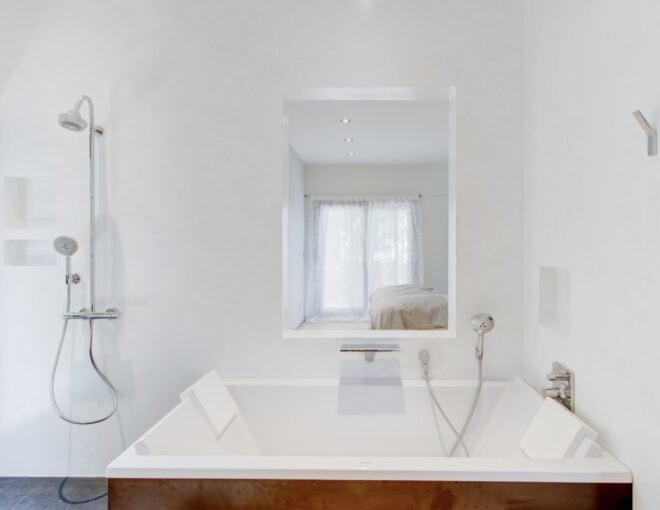 white bathroom with large soaking tub