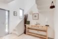 entryway with wood table