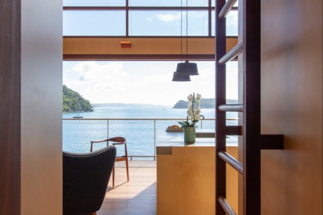 glass wall open to outdoor deck