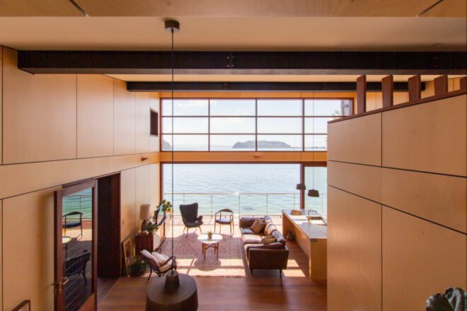 light-filled living space with floor-to-ceiling window