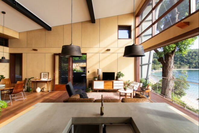 light-filled living space with slanted ceiling