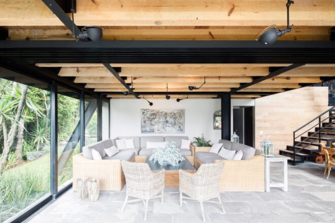outdoor living space with gray sofa