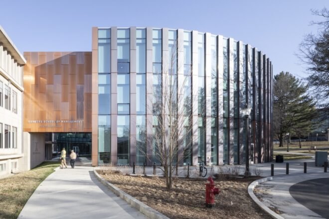 building school with copper and glass exterior
