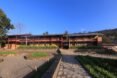courtyards outside rammed earth school buildings