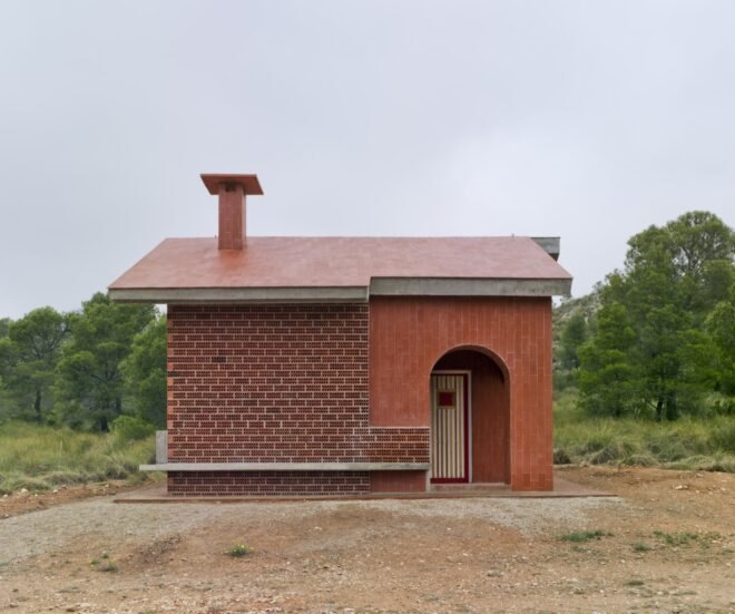 small brick home on grassy lot