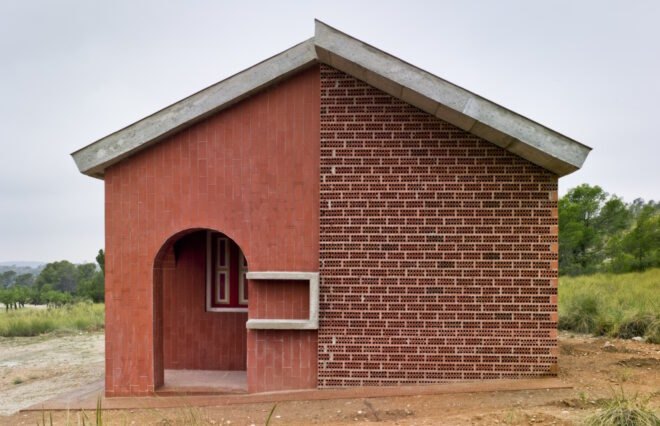 brick home with gabled roof