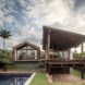 stone and brick home with large pool