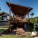 stone and brick house with huge deck