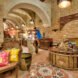 interior of hotel with stone walls and arched doorways