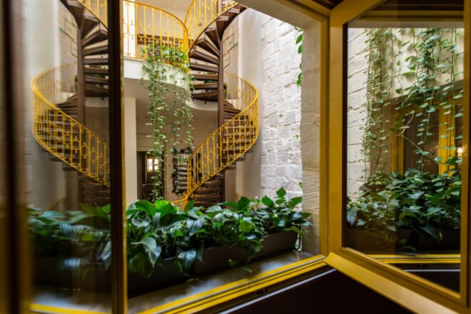 interior view of yellow spiral staircase