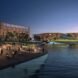 rendering of floating buildings at dusk