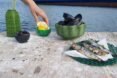 person grabbing fruit from a 3D-printed bowl