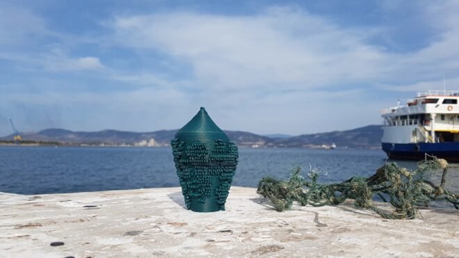 blue seashell sculpture by the sea