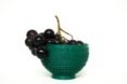 grapes in teal bowl
