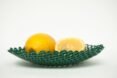 lemons in a green 3D-printed bowl