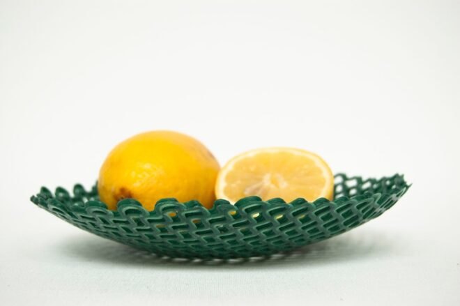 lemons in a green 3D-printed bowl