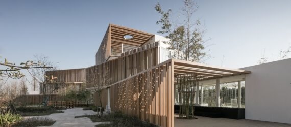 white stacked buildings with wood slatted exteriors