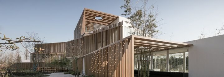 white stacked buildings with wood slatted exteriors