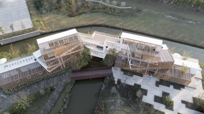 aerial view of complex made from white shipping containers
