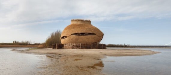 oval wood structure surrounded by water